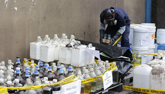 Workers destroy confiscated chemicals in Valenzuela City, the Philippines