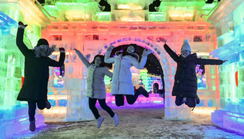 People enjoy 43rd Ice Lantern Exhibition in NE China's Harbin
