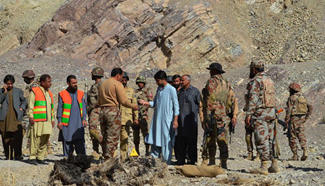 Security officials examine blast site in SW Pakistan's Quetta