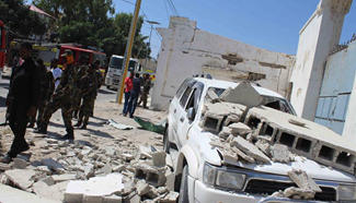 At least 2 killed in twin blasts near Somalia's AU base