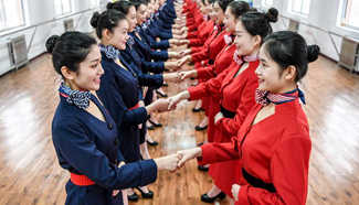 Students attend stewardess skill training in central China
