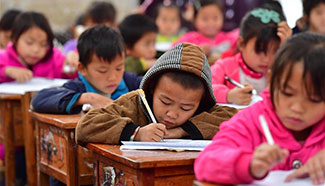 Students take exam before winter vacation, south China
