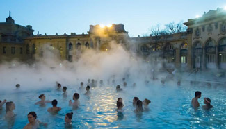People enjoy thermal baths in Budapest