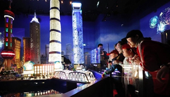 Children view architectural models at LEGOLAND Discovery Center in Shanghai