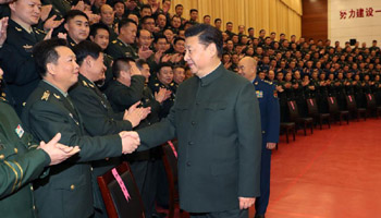Xi urges continued efforts to build strong military