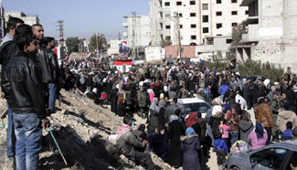 Syrians gather at entrance of al-Ziabiyeh town