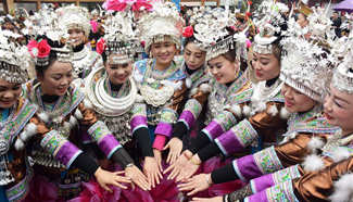 People of Miao ethnic group dance to celebrate Spring Festival