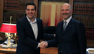 Greek PM meets with Pierre Moscovici in Athens
