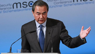 Chinese FM calls for adherence to cooperation