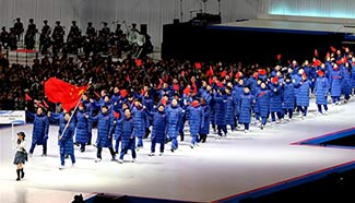 Chinese delegation march in at opening of Asian Winter Games
