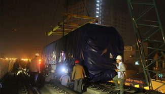 Chinese-made train car hoisted for Vietnam's first urban railway