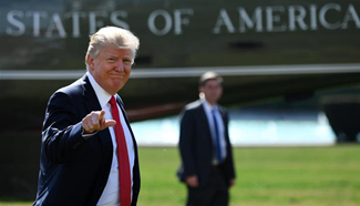 Donald Trump walks to Oval Office in Washington D.C.