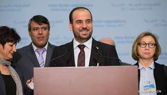 Syria's opposition delegation leader addresses press conference