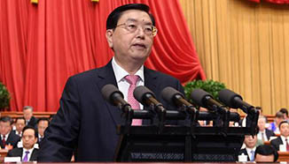 Zhang Dejiang delivers work report of NPC Standing Committee