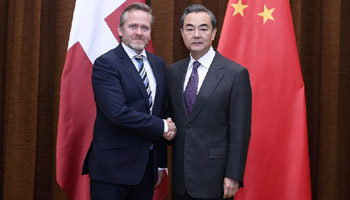 Chinese FM holds talks with Danish counterpart in Beijing