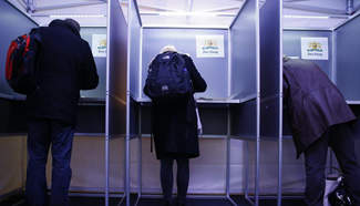 Voters prepare to cast ballot in The Hague, the Netherlands