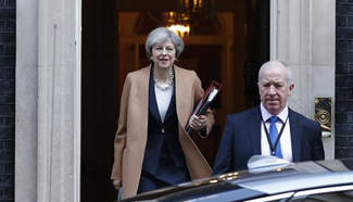 Theresa May leaves 10 Downing Street for Prime Minister's Questions in London