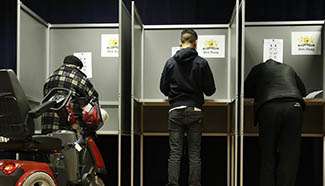 People vote for 2017 Dutch parliamentary elections in The Hague