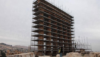 Workers prepare for maintenance work at complex of temples in Lebanon