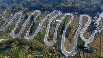 In pics: winding mountain road looks like jade belt in central China