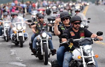 U.S. motorcyclists participate in Rolling Thunder motorcycle ride