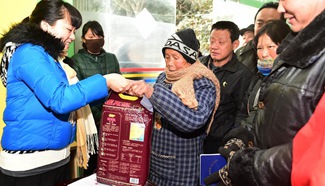 Food donated to low-income persons ahead of Spring Festival
