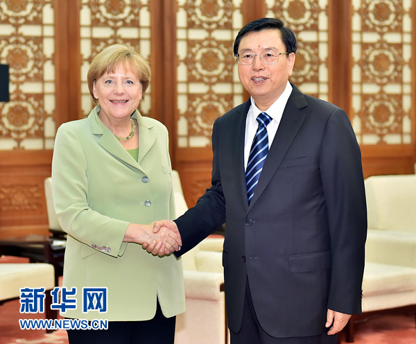 7月7日，全國人大常委會委員長張德江在北京人民大會堂會見德國總理默克爾。 新華社記者 李濤 攝 