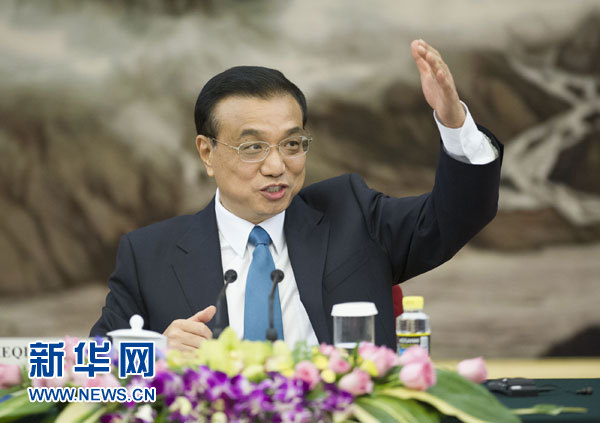 7月22日，國務院總理李克強在北京人民大會堂會見出席第六輪中美工商領袖和前高官對話的美方代表並座談。 新華社記者黃敬文攝