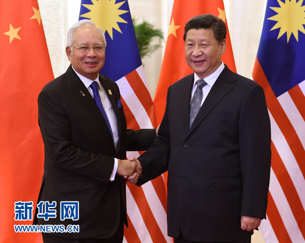 11月10日，國家主席習近平在北京人民大會堂會見馬來西亞總理納吉布。 新華社記者 馬佔成 攝