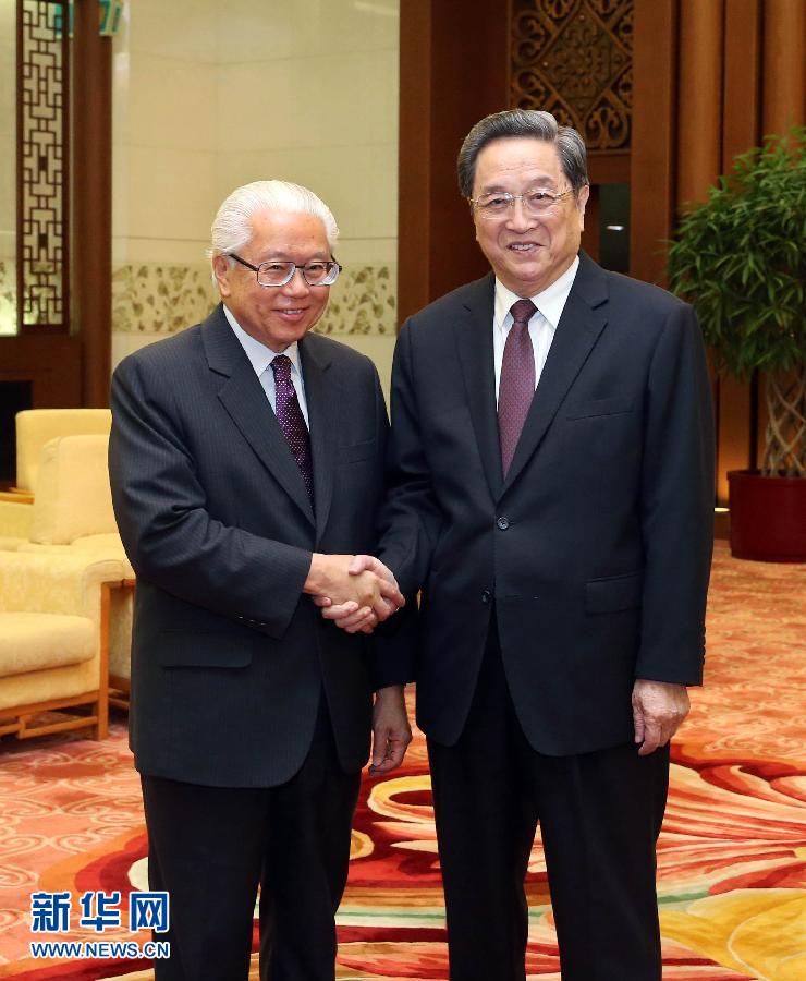 7月3日，全國政協主席俞正聲在北京人民大會堂會見新加坡總統陳慶炎。新華社記者 劉衛兵 攝