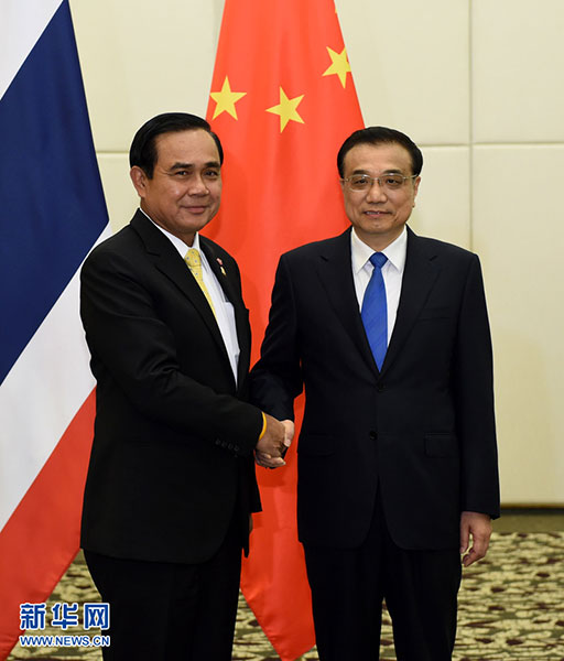 3月23日，國務院總理李克強在海南三亞會見泰國總理巴育。新華社記者 饒愛民 攝