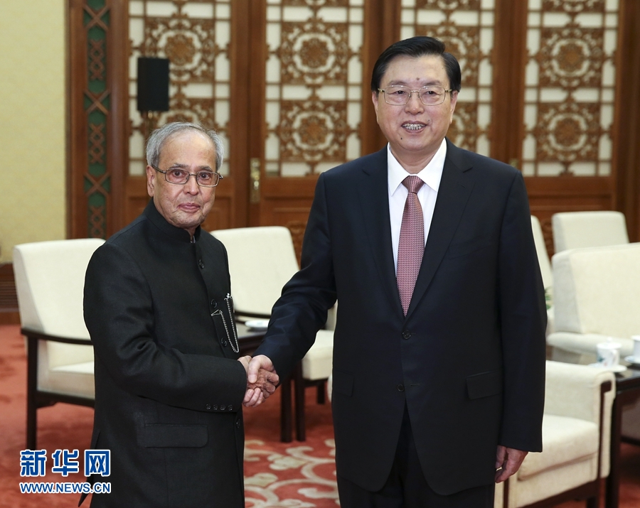 5月26日，全國人大常委會委員長張德江在北京人民大會堂會見印度總統慕克吉。 新華社記者 龐興雷 攝 