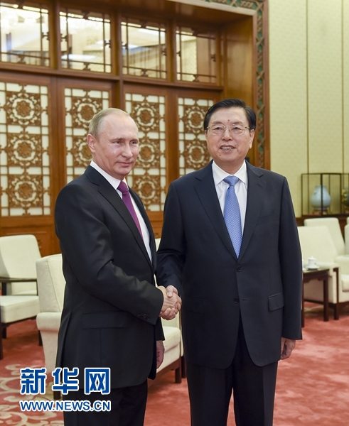 6月25日，全國人大常委會委員長張德江在北京人民大會堂會見俄羅斯總統普京。 新華社記者 李學仁 攝