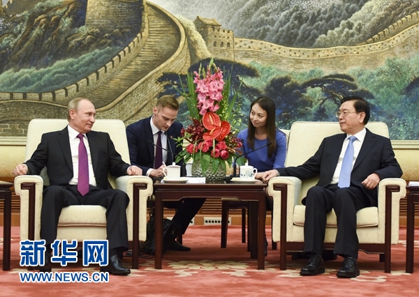6月25日，全國人大常委會委員長張德江在北京人民大會堂會見俄羅斯總統普京。 新華社記者 李學仁 攝