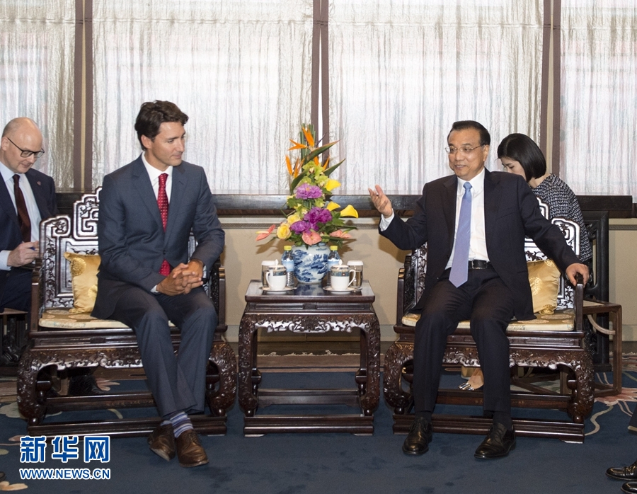 8月30日，國務院總理李克強在北京會見來華進行正式訪問的加拿大總理特魯多。 新華社記者 王曄 攝