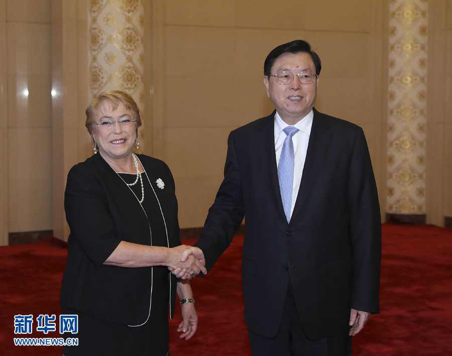 5月13日，全國人大常委會委員長張德江在北京人民大會堂會見智利總統巴切萊特。新華社記者 龐興雷 攝