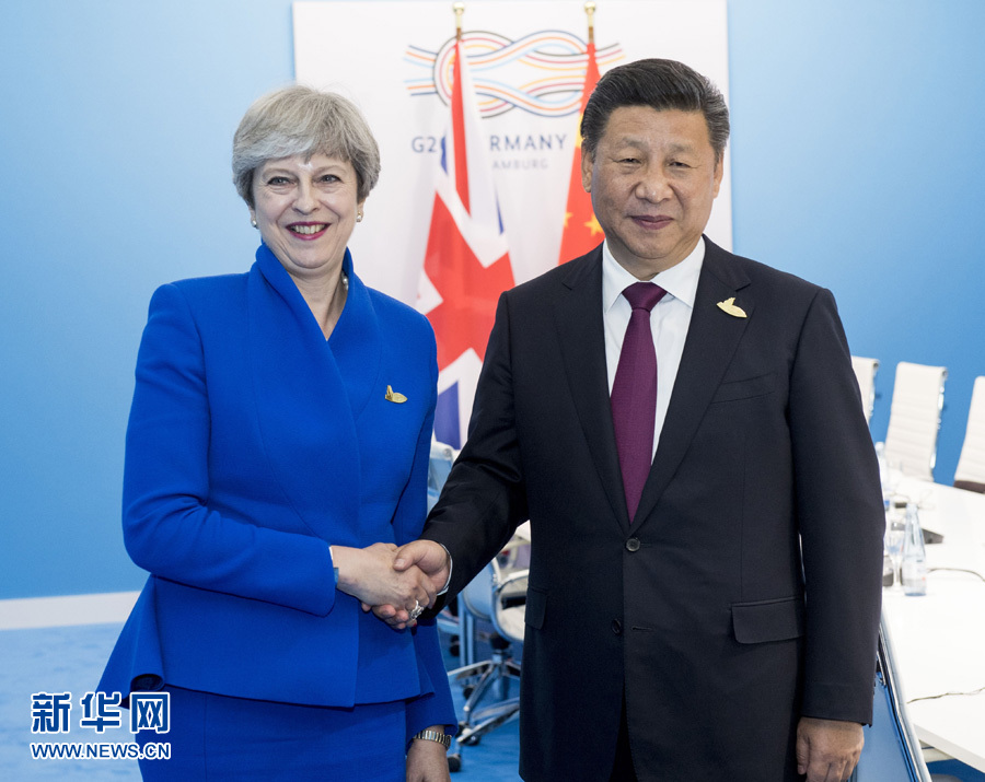 7月7日，國家主席習近平在漢堡會見英國首相特雷莎·梅。 新華社記者李學仁 攝