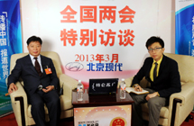 全國人大代表李樹起做客新華網、中國政府網設在大會堂的訪談間