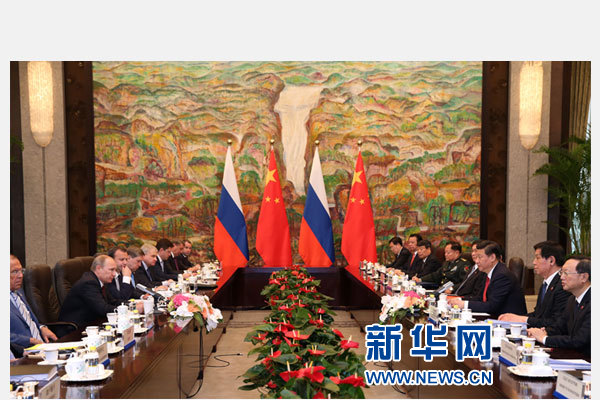5月20日，中國國家主席習近平在上海同俄羅斯總統普京舉行會談。 新華社記者 龐興雷 攝 
