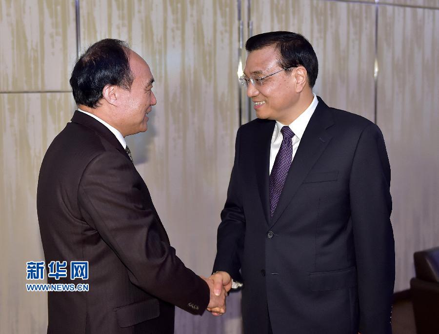 1月22日，中國國務院總理李克強在瑞士蘇黎世會見國際電信聯盟秘書長趙厚麟。 新華社記者 李濤 攝 
