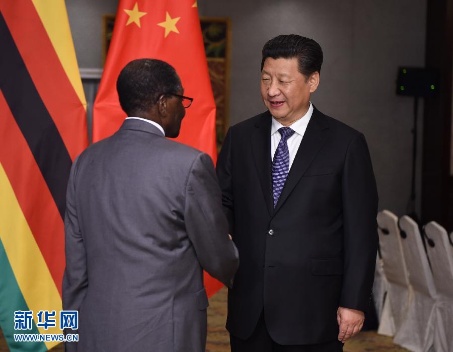 4月23日，國家主席習近平在雅加達會見津巴布韋總統穆加貝。 新華社記者 謝環馳 攝