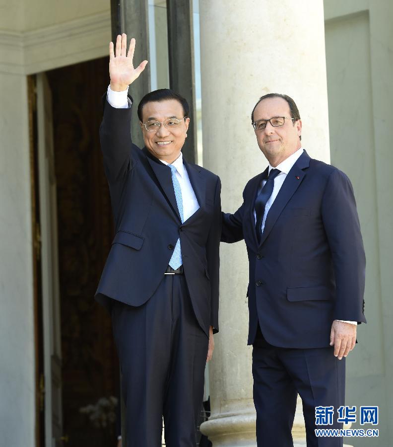 當地時間6月30日下午，中國國務院總理李克強在巴黎愛麗舍宮會見法國總統奧朗德。 新華社記者李學仁攝 