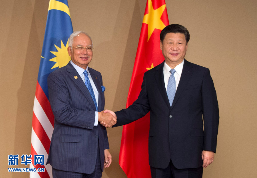 11月17日，國家主席習近平在菲律賓馬尼拉會見馬來西亞總理納吉布。 新華社記者 謝環馳 攝