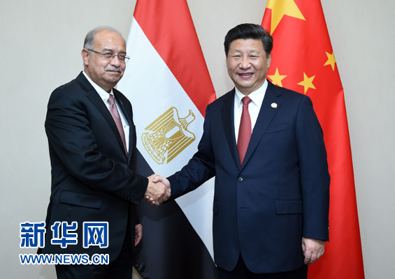 12月4日，國家主席習近平在約翰內斯堡會見埃及總理伊斯梅爾。新華社記者 張鐸 攝 