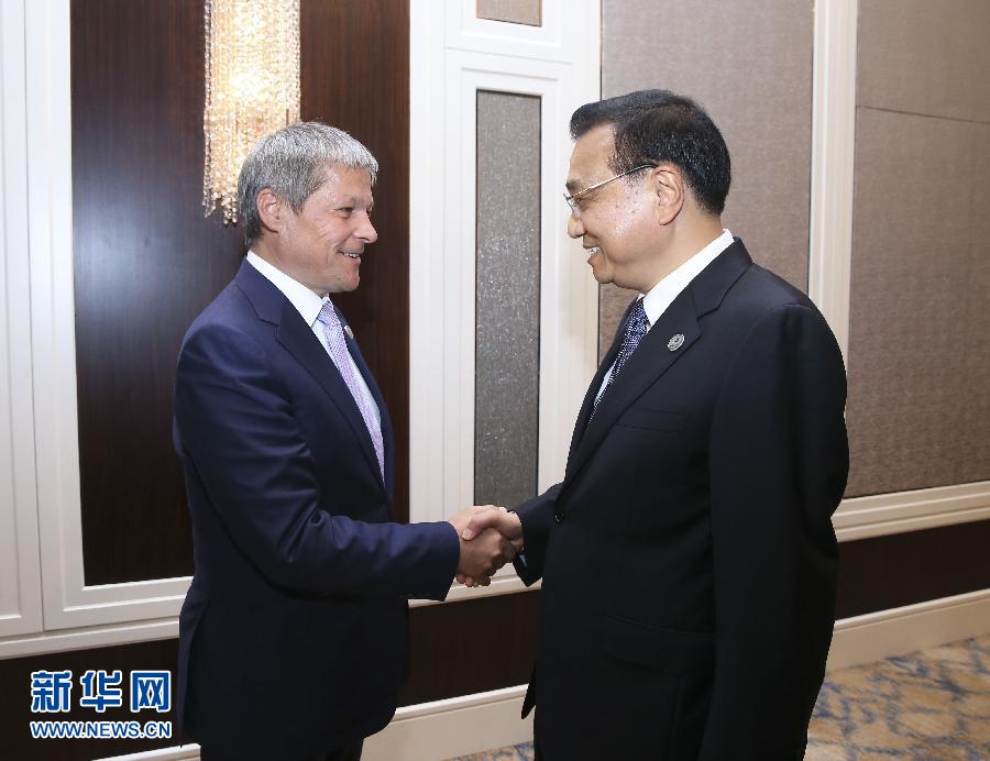 7月15日，中國國務院總理李克強在烏蘭巴托會見羅馬尼亞總理喬洛什。 新華社記者 龐興雷 攝 
