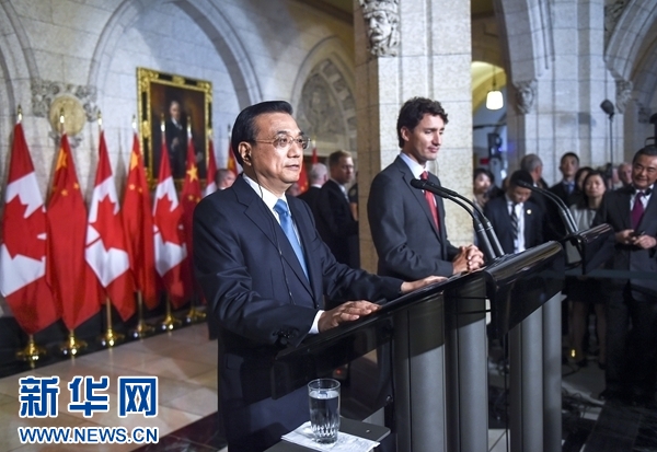 9月22日，國務院總理李克強在渥太華議會大廈同加拿大總理特魯多會談後共同會見記者。 新華社記者李學仁攝