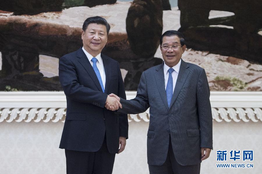 10月13日，國家主席習近平在金邊同柬埔寨首相洪森舉行會談。新華社記者謝環馳攝 
