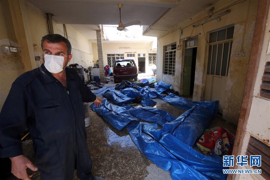 （外代一線）（9）伊軍方説從摩蘇爾一被炸建築內挖出61具遺體