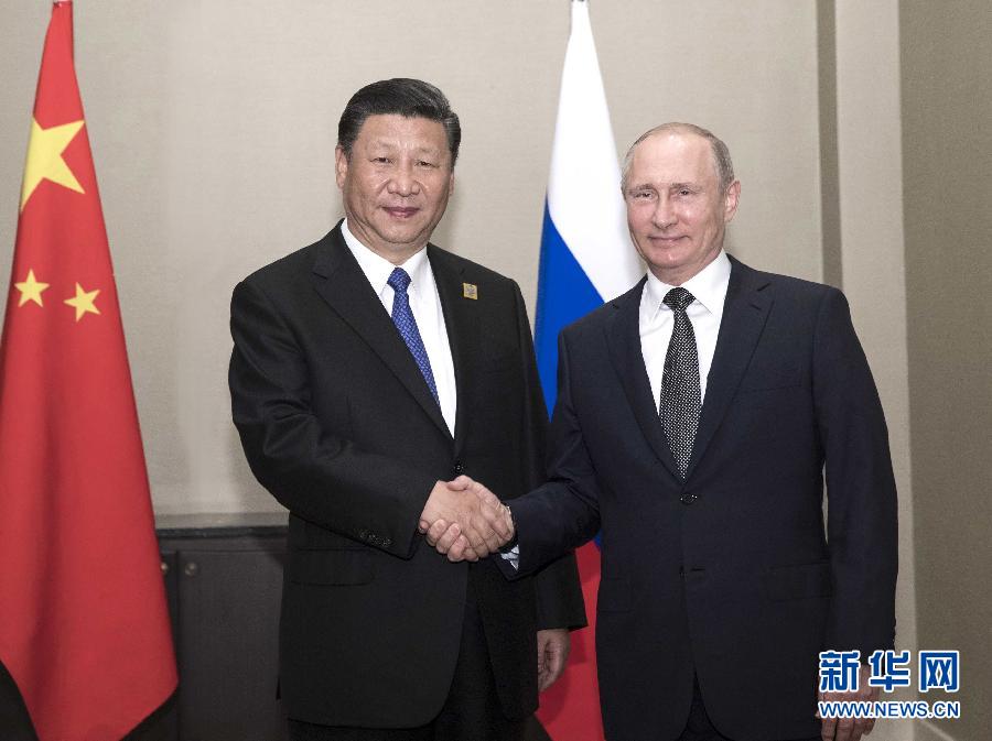 6月8日，國家主席習近平在阿斯塔納會見俄羅斯總統普京。 新華社記者蘭紅光 攝