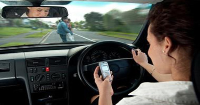 從新加坡禁止“開車用手機”談起